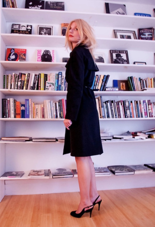 Trench Coat, bookcase. Kimara Dixon Photo.