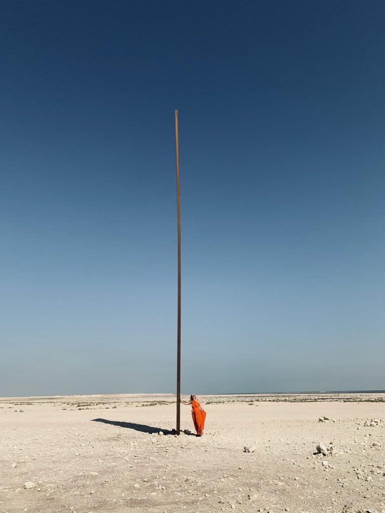 Tijana in Qatari Desert by Richard Serra's East-West/West-East