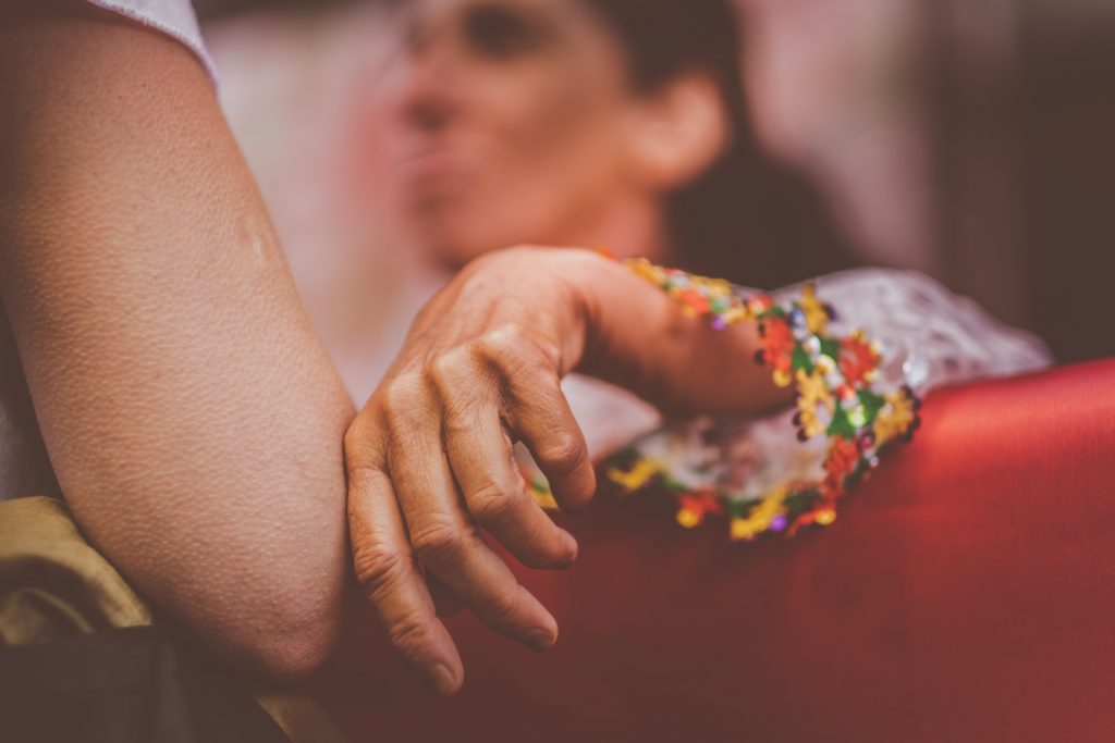 A hand detail of an older woman.