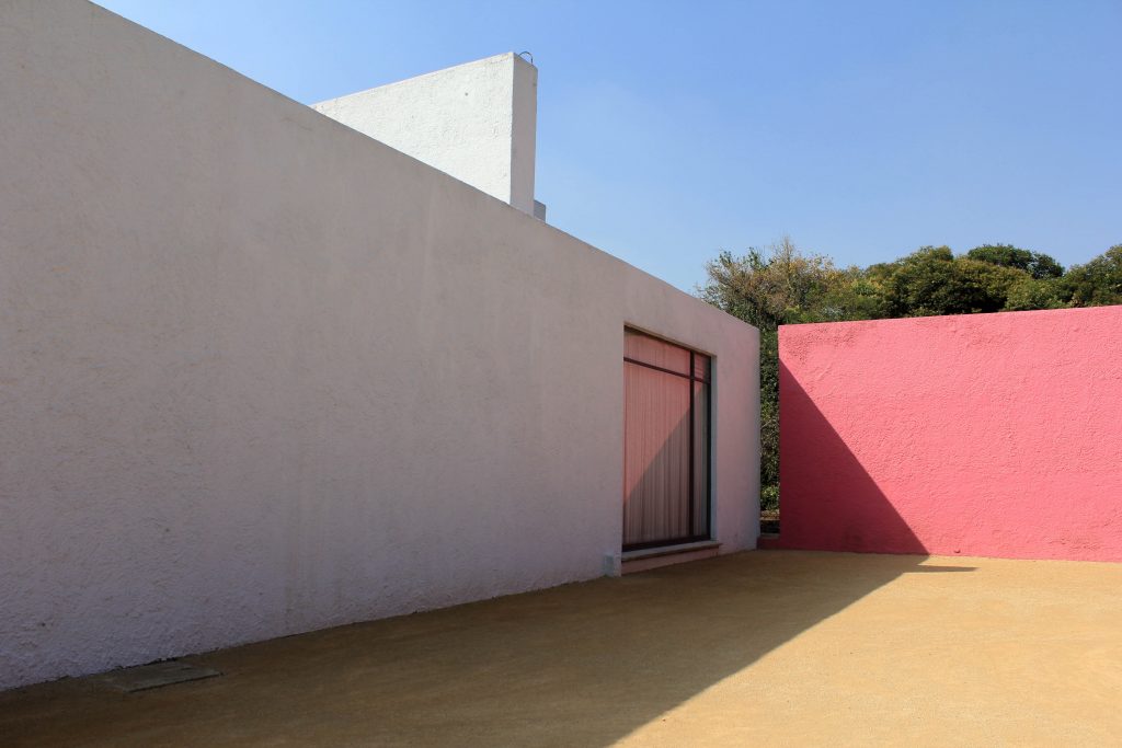 Shadow and light play against soft pink and white walls. Barragan.