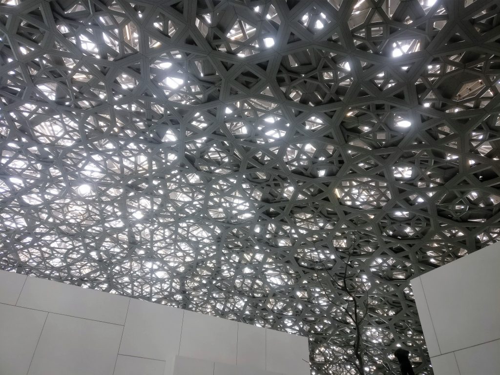 The intricate roof and Louvre Abu Dhabi