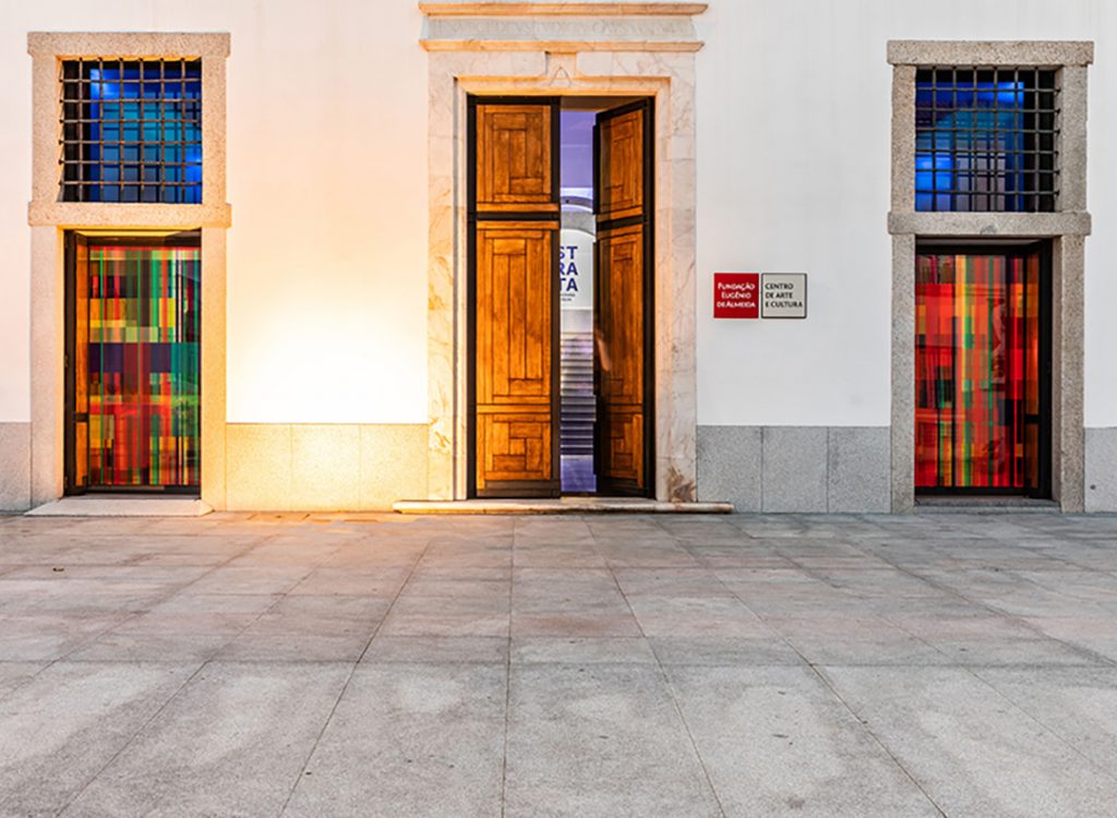 A door open between two artworks from the STRATA exhibition by Deanna Sirlin at the Fundação Eugénio de Almeida Portugal